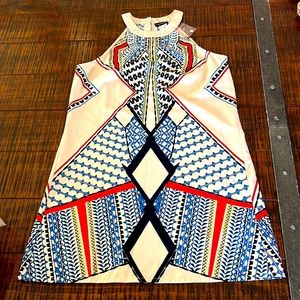 Cute short dress. Multi colored. Never worn